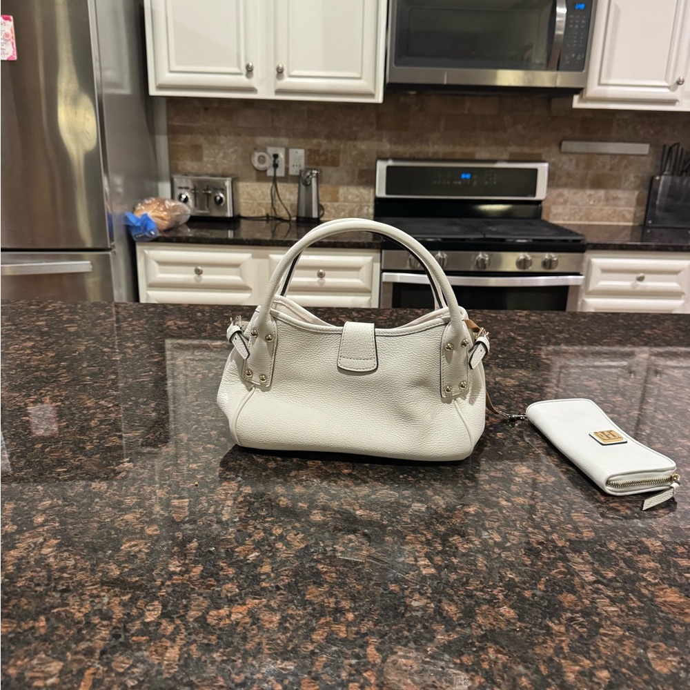 Dooney and bourke with matching wallet.